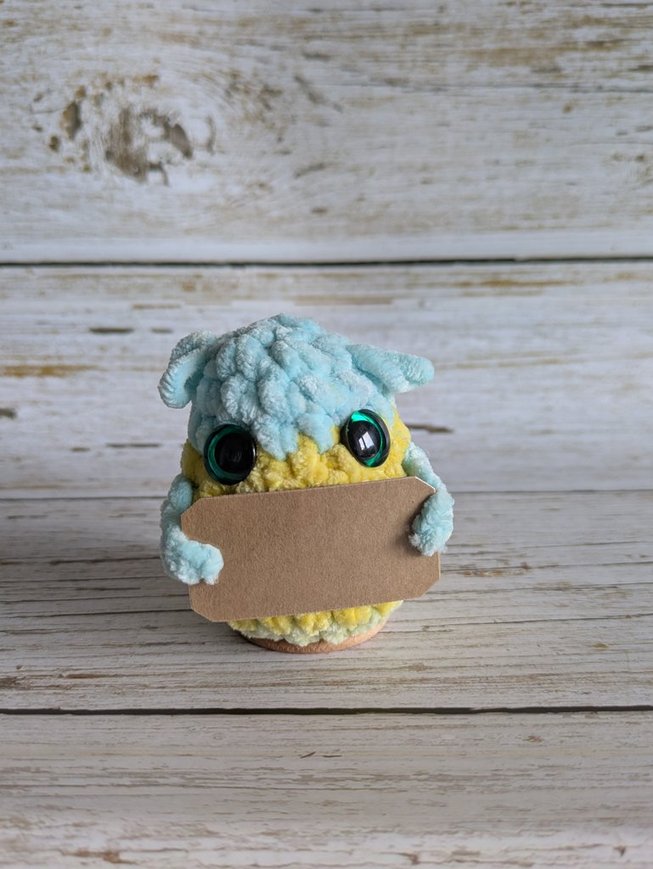 ptit truc en pluche bleu-jaune-vert